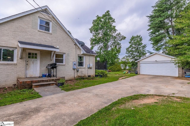 6913 White Horse Rd, Greenville, SC 29611 - view of front of property with a trampoline, an outbuilding, a garage, a front lawn, and brick siding