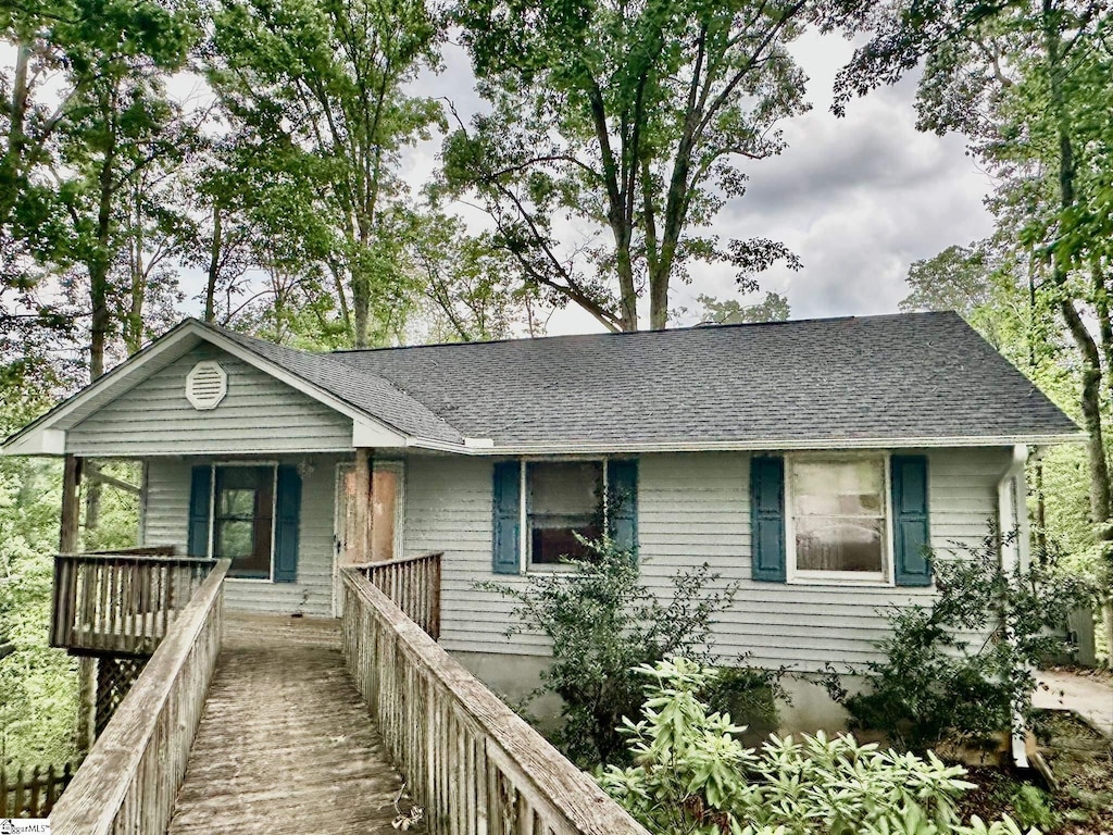 115 Mountain Chase Dr, Taylors, SC 29687 - ranch-style house featuring a porch and roof with shingles