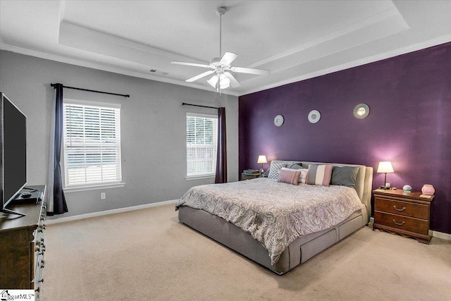 102 Eagle Pass Dr, Taylors, SC 29687 - carpeted bedroom with crown molding, baseboards, a raised ceiling, ceiling fan, and an accent wall