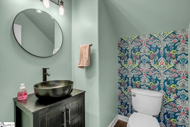 102 Eagle Pass Dr, Taylors, SC 29687 - bathroom featuring toilet, vanity, baseboards, and wood finished floors