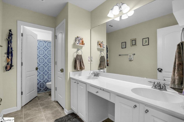 102 Eagle Pass Dr, Taylors, SC 29687 - bathroom with toilet, double vanity, and tile patterned floors