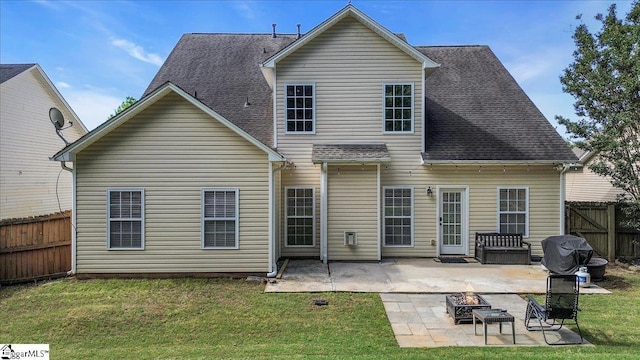 102 Eagle Pass Dr, Taylors, SC 29687 - rear view of property featuring an outdoor fire pit, a patio area, and a shingled roof