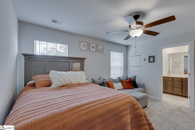 404 Hillrock Ct, Greenville, SC 29617 - bedroom with light carpet, ceiling fan, ensuite bath, and baseboards
