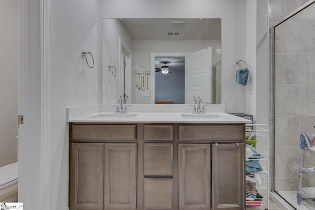 404 Hillrock Ct, Greenville, SC 29617 - ensuite bathroom with a stall shower, double vanity, a ceiling fan, and toilet