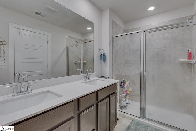 404 Hillrock Ct, Greenville, SC 29617 - full bath with a stall shower, double vanity, and recessed lighting