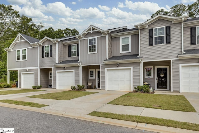 404 Hillrock Ct, Greenville, SC 29617 - townhome / multi-family property featuring driveway, a front yard, and a garage