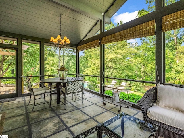 11 Hearthstone Ln, Landrum, SC 29356 - sunroom with outdoor dining space, a chandelier, and plenty of natural light