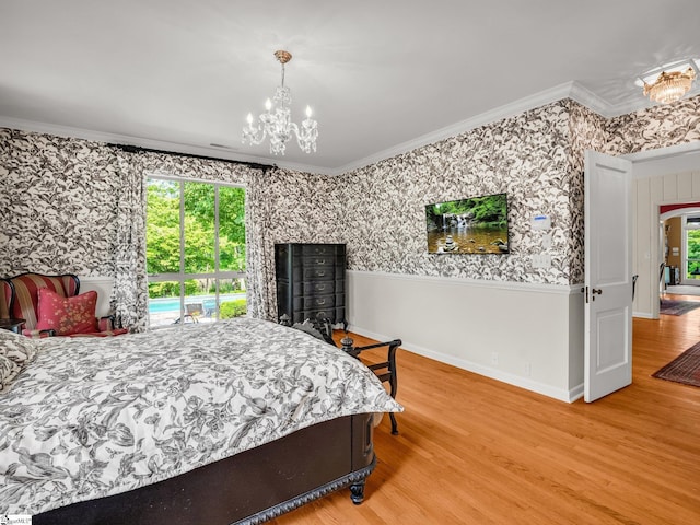 11 Hearthstone Ln, Landrum, SC 29356 - bedroom with ornamental molding, wood finished floors, a chandelier, and wallpapered walls