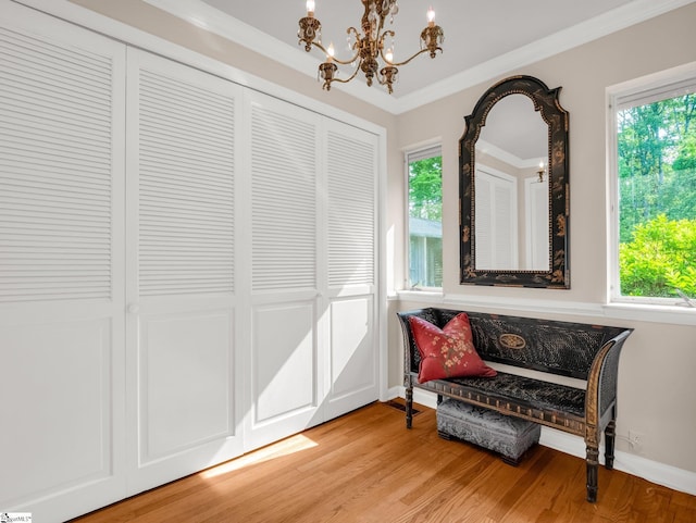 11 Hearthstone Ln, Landrum, SC 29356 - living area with a chandelier, light wood-type flooring, and crown molding