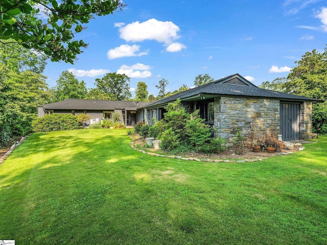 11 Hearthstone Ln, Landrum, SC 29356 - rear view of house featuring a yard and stone siding