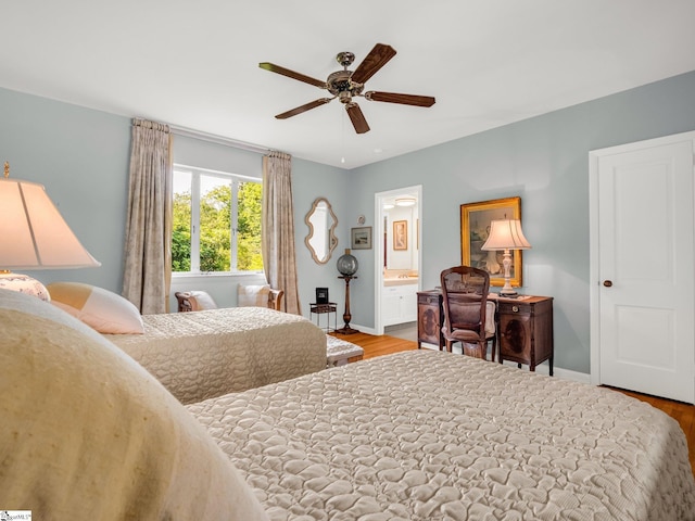 11 Hearthstone Ln, Landrum, SC 29356 - bedroom with wood finished floors, connected bathroom, and a ceiling fan