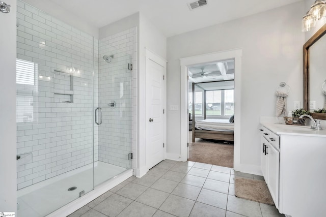 706 Torridon Ln, Simpsonville, SC 29681 - ensuite bathroom featuring a shower stall, vanity, tile patterned flooring, and ceiling fan