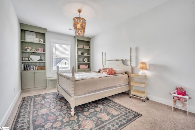 706 Torridon Ln, Simpsonville, SC 29681 - bedroom featuring carpet, baseboards, and a chandelier