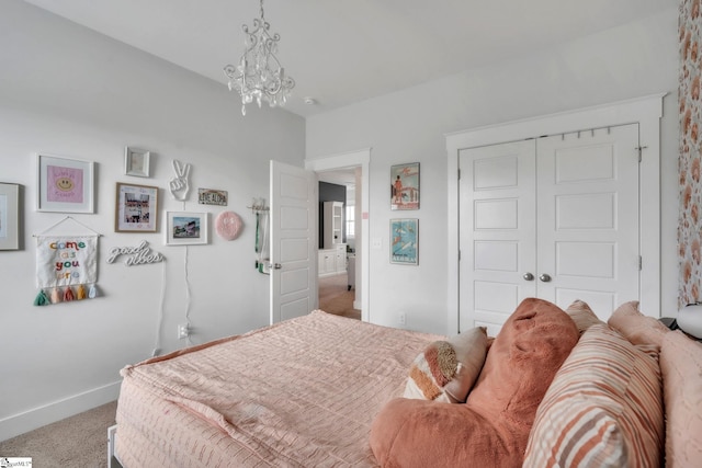 706 Torridon Ln, Simpsonville, SC 29681 - bedroom featuring carpet, baseboards, a closet, and a chandelier