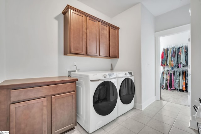 706 Torridon Ln, Simpsonville, SC 29681 - washroom with cabinet space, separate washer and dryer, light tile patterned floors, and baseboards