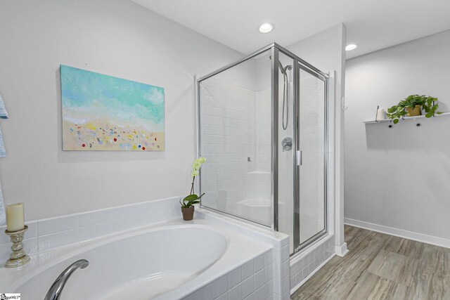 219 Button Willow St, Taylors, SC 29687 - bathroom featuring a bath, a shower stall, wood finished floors, and recessed lighting