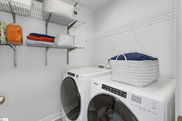 219 Button Willow St, Taylors, SC 29687 - laundry area with washing machine and clothes dryer and baseboards