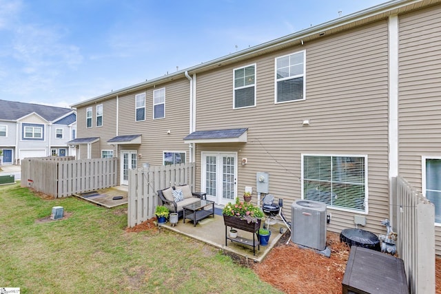 219 Button Willow St, Taylors, SC 29687 - rear view of house featuring central AC unit, outdoor lounge area, and a patio