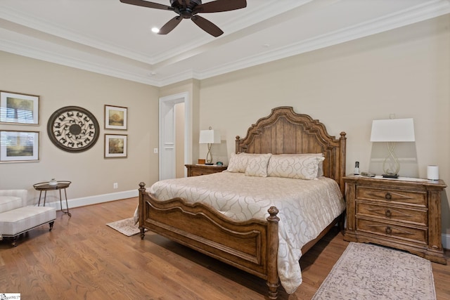 105 Hampton Grove Way, Greenville, SC 29617 - bedroom with wood finished floors, baseboards, a raised ceiling, ceiling fan, and ornamental molding