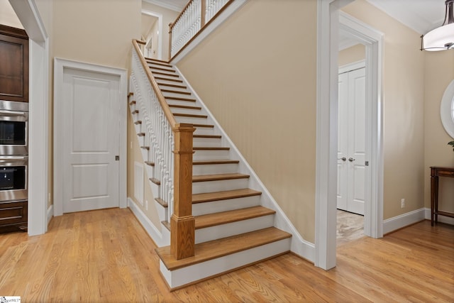 105 Hampton Grove Way, Greenville, SC 29617 - staircase with wood finished floors, baseboards, and ornamental molding
