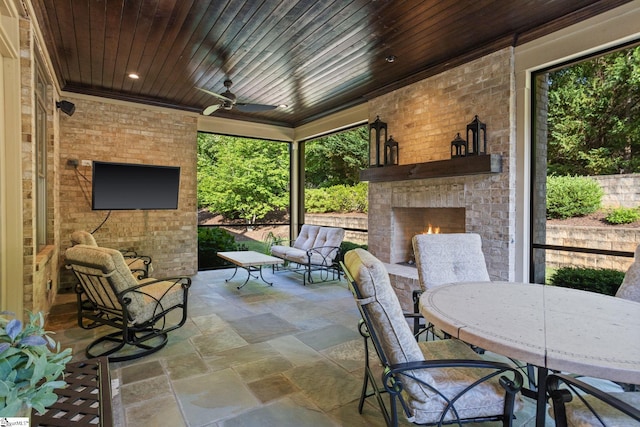 105 Hampton Grove Way, Greenville, SC 29617 - sunroom with an outdoor brick fireplace and ceiling fan