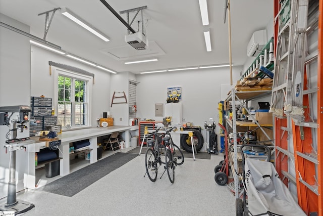 105 Hampton Grove Way, Greenville, SC 29617 - garage featuring a workshop area, a garage door opener, electric panel, and a wall mounted air conditioner