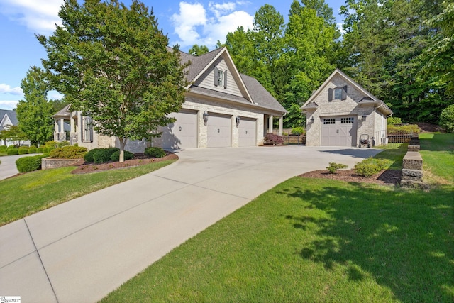 105 Hampton Grove Way, Greenville, SC 29617 - view of front of property featuring a garage, a front lawn, concrete driveway, and stone siding