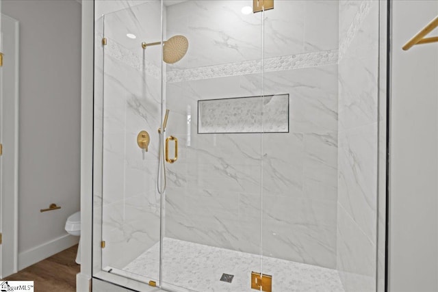 148 Duncan Chapel Rd, Greenville, SC 29617 - full bathroom featuring a marble finish shower, toilet, and wood finished floors