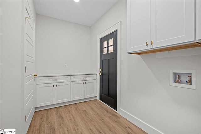 148 Duncan Chapel Rd, Greenville, SC 29617 - washroom with cabinet space, hookup for a washing machine, light wood finished floors, and baseboards