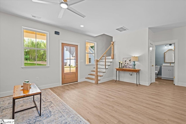148 Duncan Chapel Rd, Greenville, SC 29617 - entryway with light wood finished floors, stairs, ceiling fan, baseboards, and recessed lighting