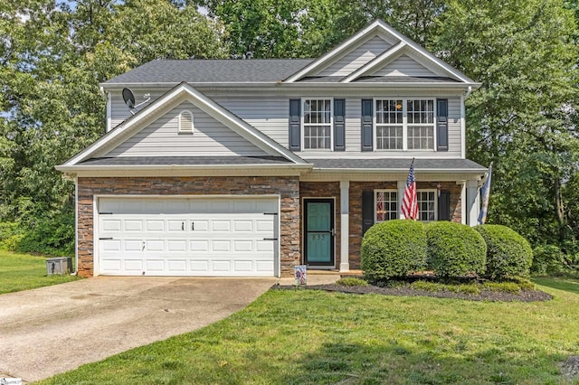 835 Terrace Creek Dr, Duncan, SC 29334 - view of front of house with driveway, a front lawn, stone siding, and a porch