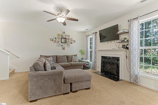 835 Terrace Creek Dr, Duncan, SC 29334 - carpeted living area with a premium fireplace, a ceiling fan, stairway, and baseboards