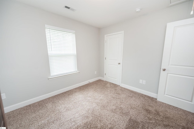 135 Mill Gin Rd, Campobello, SC 29322 - unfurnished bedroom with carpet flooring and baseboards