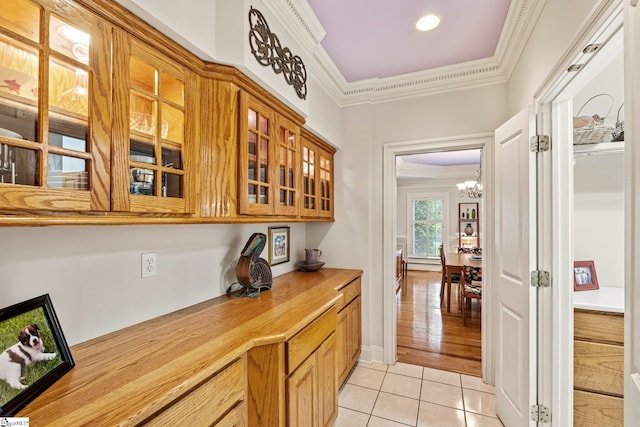 120 Thornblade Blvd, Greer, SC 29650 - hall featuring ornamental molding, light tile patterned floors, and a chandelier