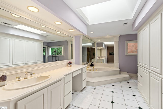 120 Thornblade Blvd, Greer, SC 29650 - bathroom with recessed lighting, vanity, tile patterned floors, a garden tub, and a skylight