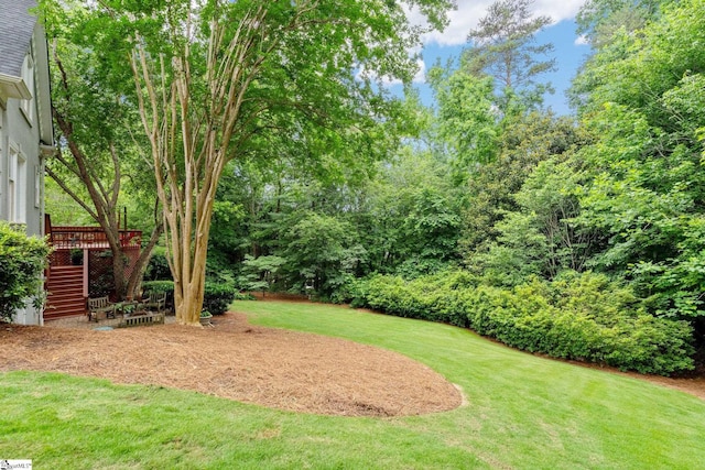 120 Thornblade Blvd, Greer, SC 29650 - view of green lawn with stairs and a wooden deck