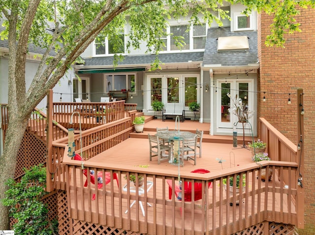 120 Thornblade Blvd, Greer, SC 29650 - rear view of house with a shingled roof, a wooden deck, and outdoor dining space