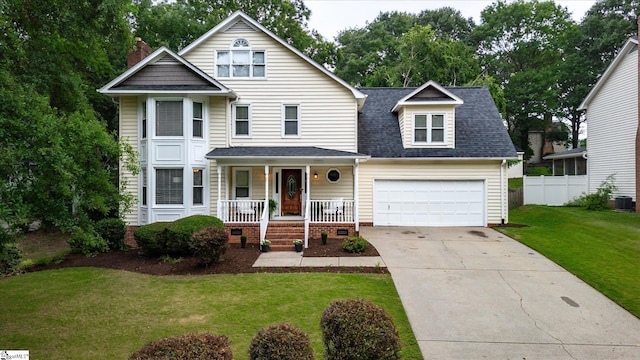 121 Legrae Ln, Taylors, SC 29687 - traditional-style house with a porch, driveway, a shingled roof, a garage, and central air condition unit