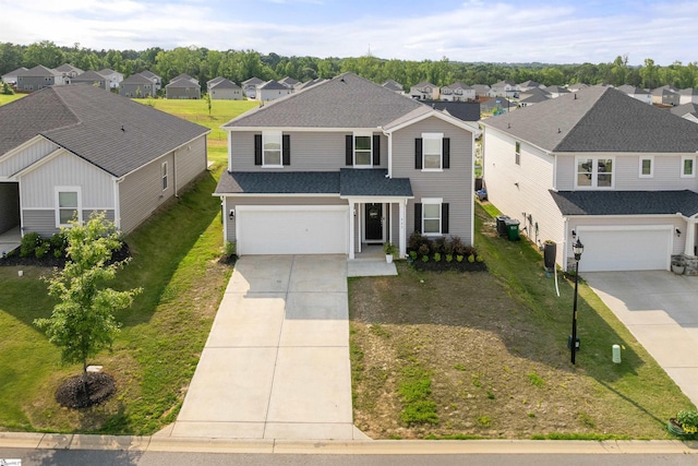 925 Appalachian Dr, Moore, SC 29369 - traditional home with concrete driveway, a garage, a residential view, a front yard, and roof with shingles