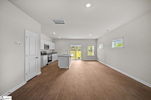 215 Islay Way, Anderson, SC 29621 - unfurnished living room with dark wood-type flooring and recessed lighting