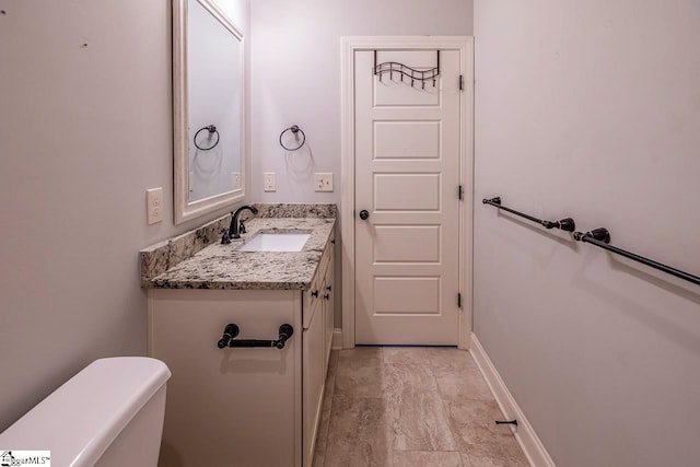 716 Adaline Pl, Inman, SC 29349 - half bath featuring vanity, toilet, and baseboards