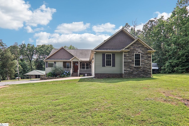 310 Wofford Rd, Pauline, SC 29374 - craftsman-style home featuring covered porch, a front lawn, and stone siding