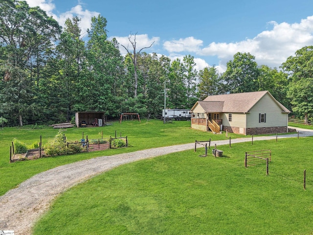 310 Wofford Rd, Pauline, SC 29374 - view of property's community with a yard, an outdoor structure, and driveway