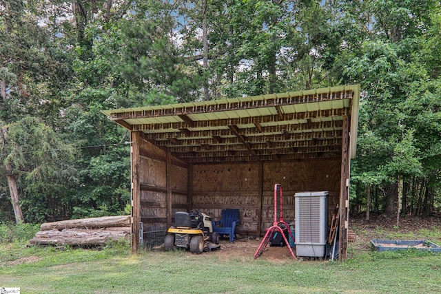 310 Wofford Rd, Pauline, SC 29374 - view of pole building with a yard, a carport, and central air condition unit