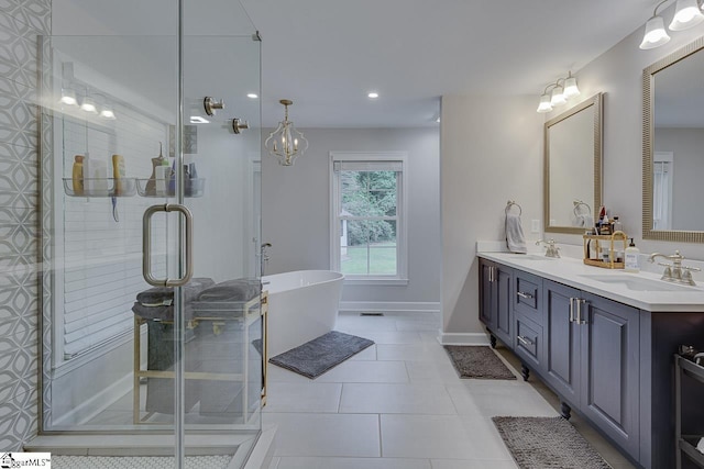 9 Mountain Brook Trl, Greenville, SC 29609 - bathroom with double vanity, a freestanding bath, a shower stall, recessed lighting, and tile patterned floors