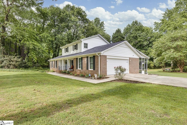 9 Mountain Brook Trl, Greenville, SC 29609 - view of front of house with brick siding, a porch, concrete driveway, an attached garage, and a front yard