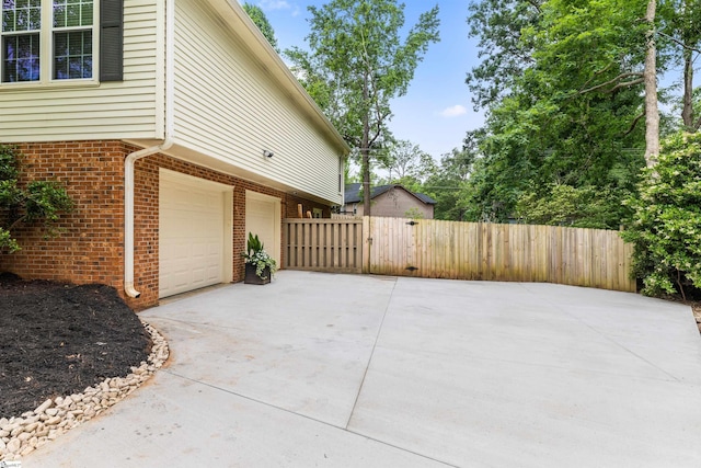 109 Appomattox Dr, Simpsonville, SC 29681 - view of patio with an attached garage and concrete driveway
