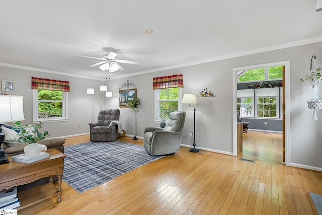 101 Long View Ln, Pickens, SC 29671 - living room featuring a ceiling fan, light wood-style flooring, baseboards, and crown molding