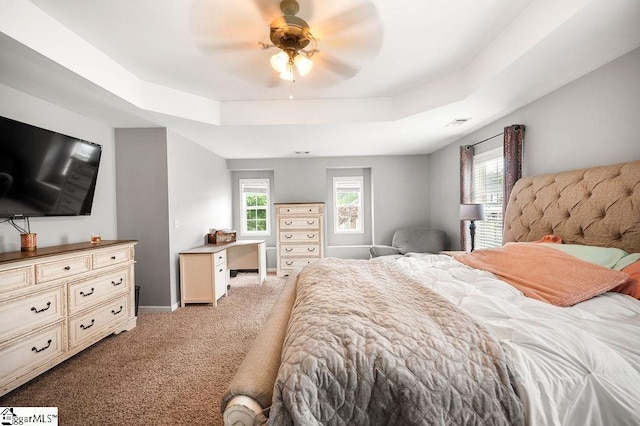 9 Peninsula Ct, Simpsonville, SC 29681 - bedroom featuring a tray ceiling, light carpet, baseboards, and a ceiling fan