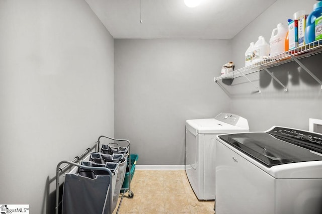 9 Peninsula Ct, Simpsonville, SC 29681 - washroom with separate washer and dryer, light tile patterned flooring, and baseboards